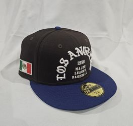 LA Dodgers Dark Brown Crown / Royal Visor / Los Angeles 1958 Old English Arch Logo / Mexico Flag Side Patch / Green UV 5950 Fitted 7 1/8. $70
