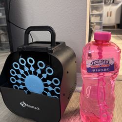 Indoor/Outdoor Bubble Machine - Comes With Large Bottle Of Bubbles. Works perfectly.