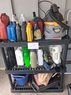 Shop vac, oils and shelf