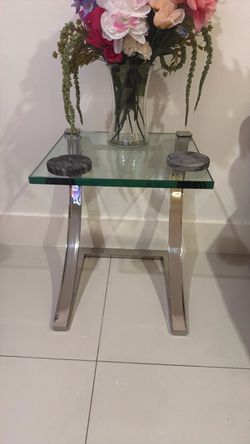 Glass table with chrome legs