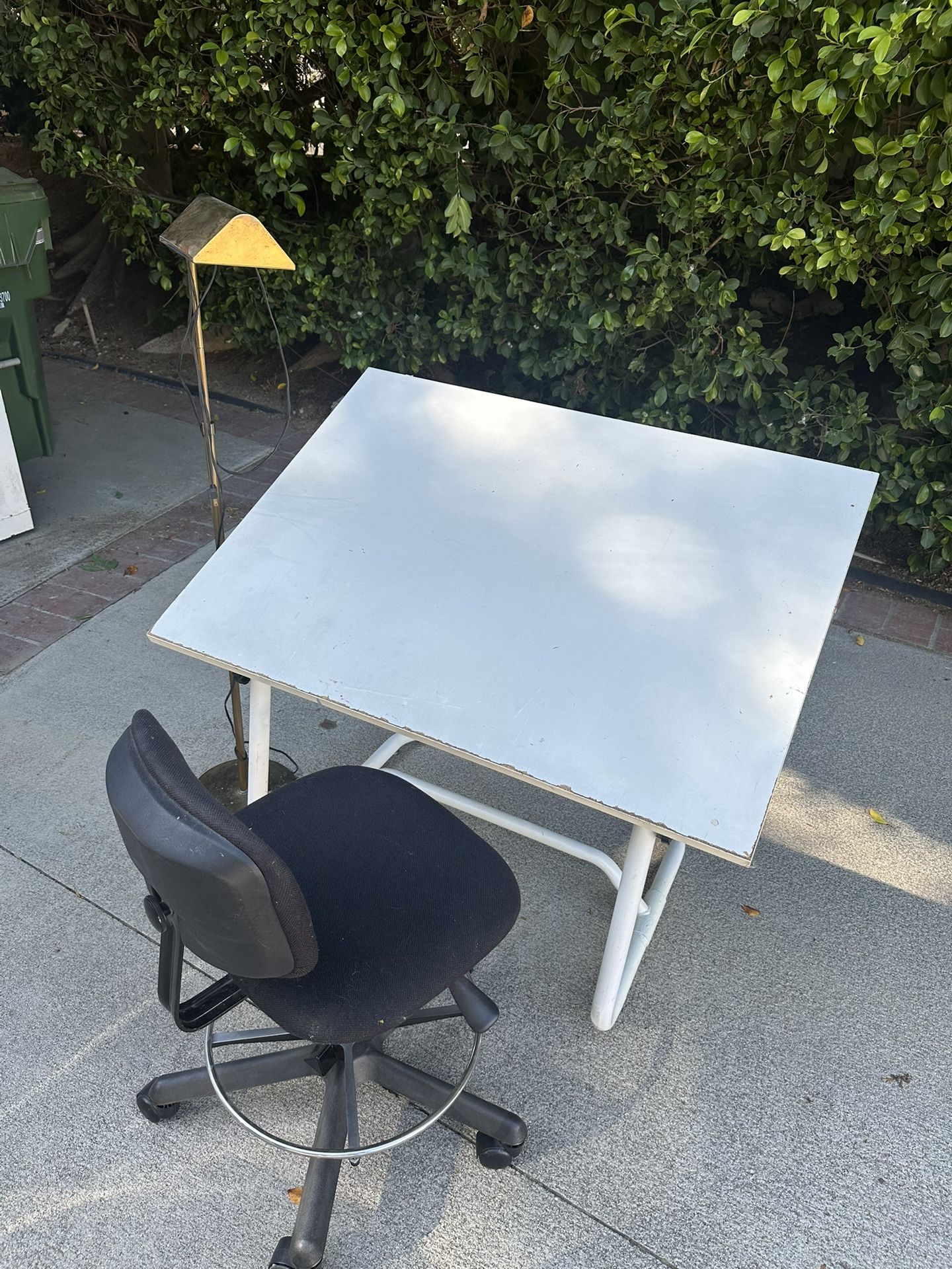 Drafting table, chair, lamp