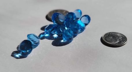 12 pieces electric blue topaz 76.72 total carats