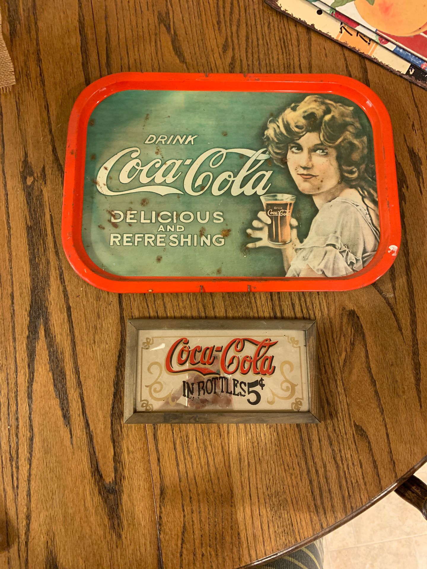 Antique Coca Cola sign and mirror sign