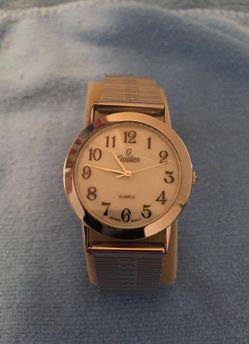Silver tone watch and band