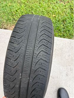 4 tires and rims Pirelli tires 215/60/r16 5 lug over three quarter tread come off Nissan Altima