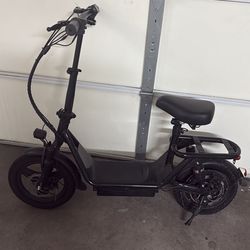 Seated electric scooter