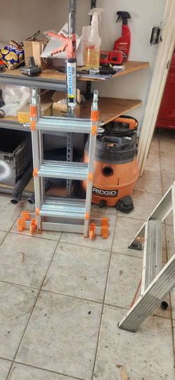 brand new multi ladder with wheels