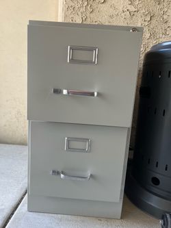 Two drawer metal file cabinet