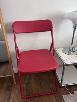 IKEA folding red chair