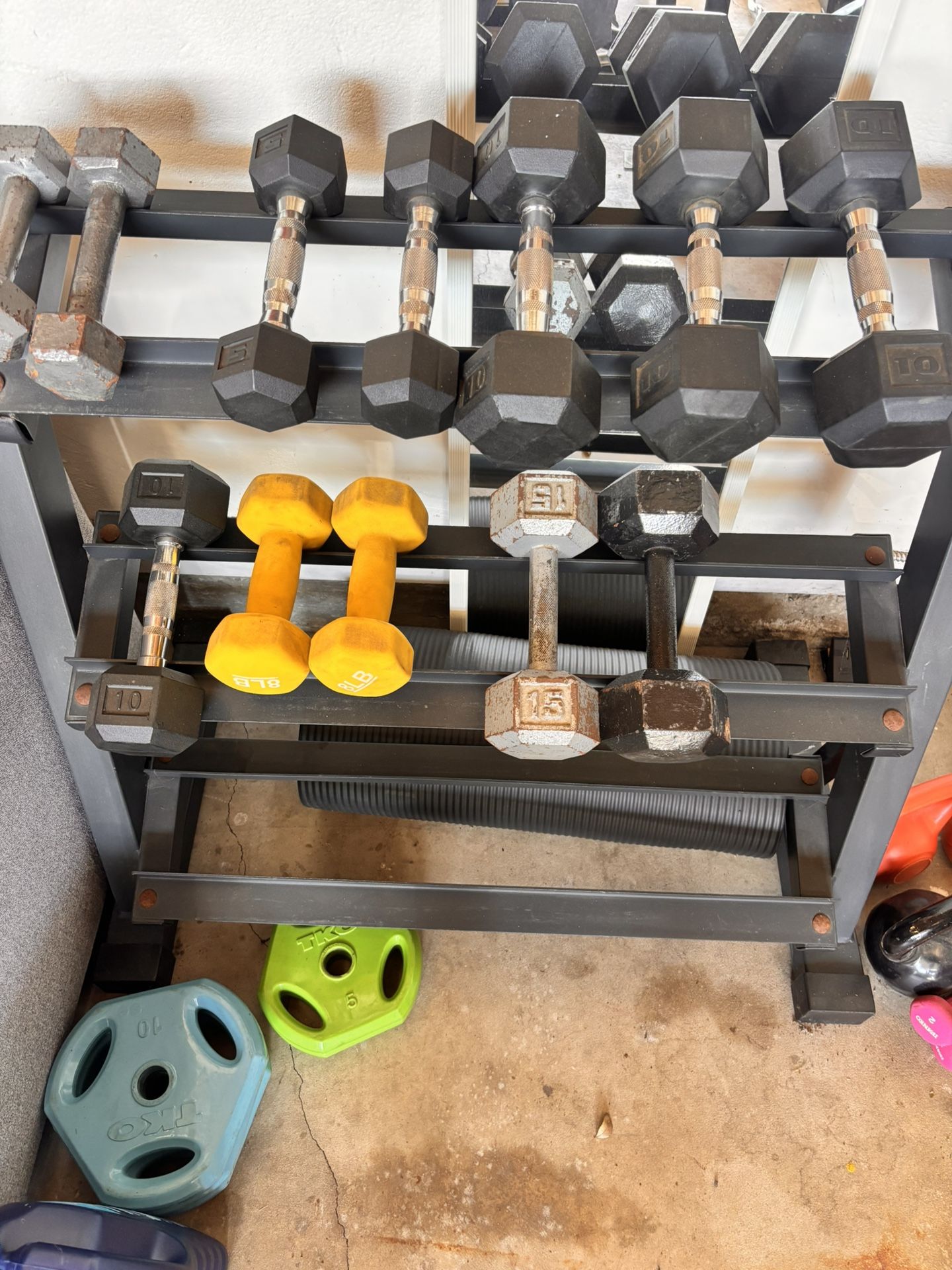 Dumbbells rack With A Few Dumbbells