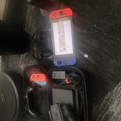 Nintendo Switch with Accessories and A Game