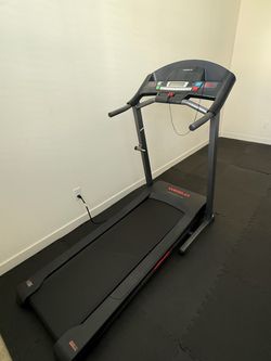 Weslo Cadence G 5.9i Folding Treadmill. Free floor tile mats included.