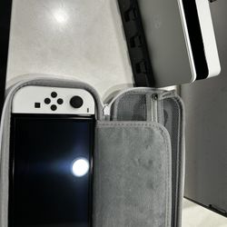 Nintendo Switch White (Come with case and charger)