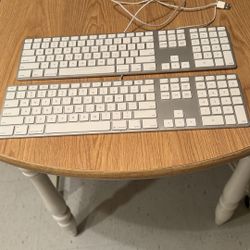 2 Wired Apple Keyboards