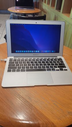 MacBook Air 11 inch with charger I can deliver