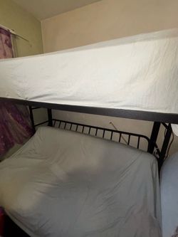 Metal bunk beds with mattresses included