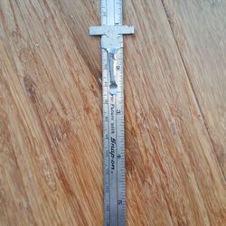 Snap on pocket ruler with metric conversion