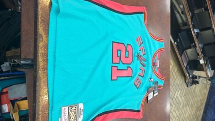 Mitchell & ness 1998-99 Tim Duncan Teal Jersey w/ pink lettering