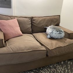 brown loveseat couch sofa