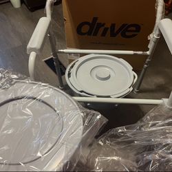 Drive Medical folding steel bedside commode