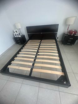 Solid wood queen size bed with headboard, base and bed slats.