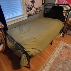 Free twin bed, mattress, sheets, and comforter 