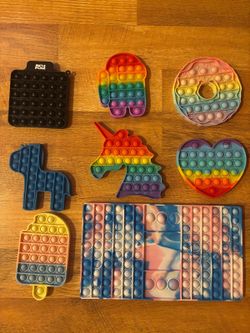 Pop It Fidget Toy Set — 8 Pieces (Unicorn, Among Us, ASU, Big Board)