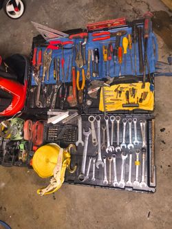 A variety of tools: straps, pliers, Phillips screwdrivers, etc.