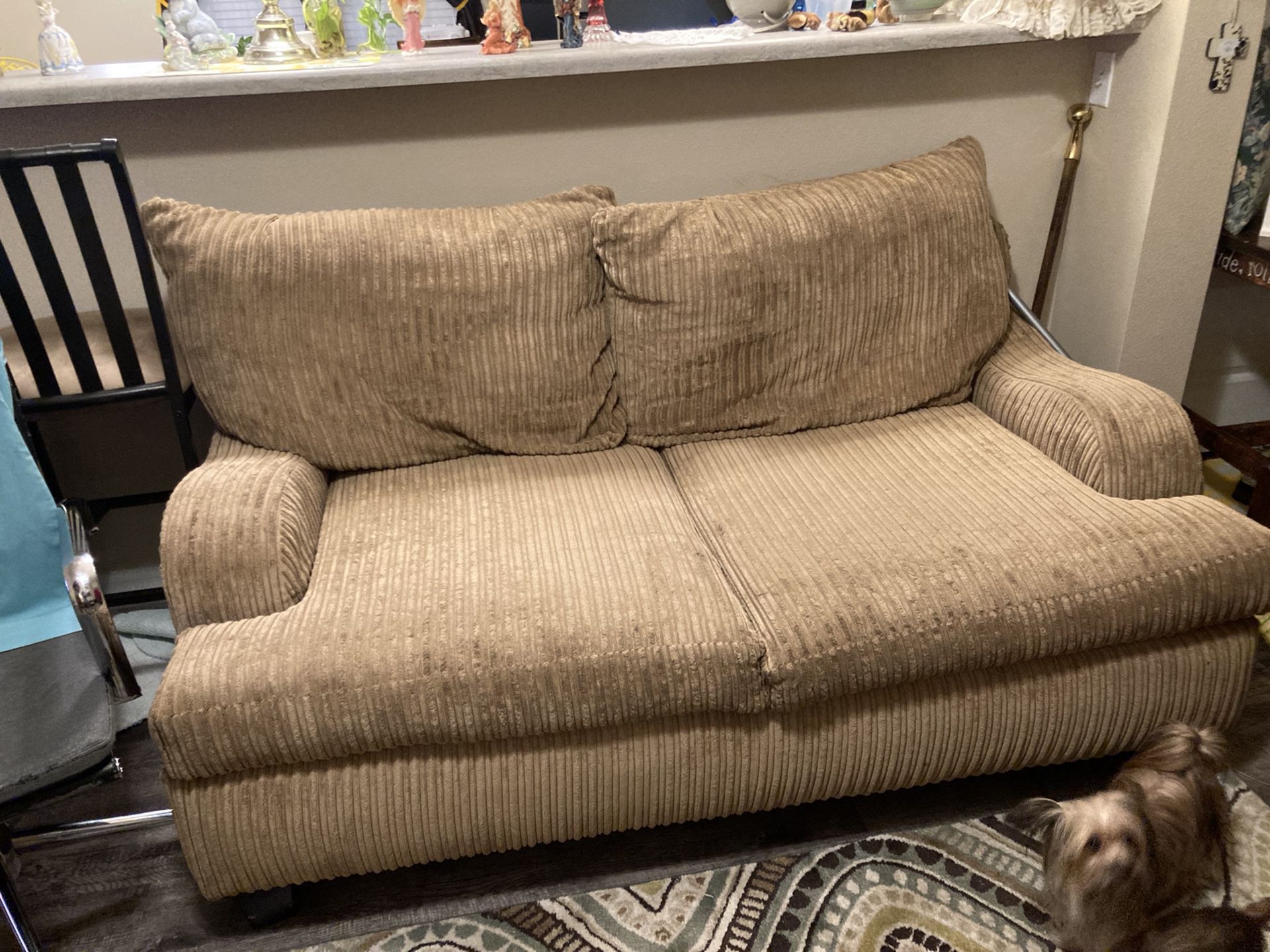 brown/tan couch. 