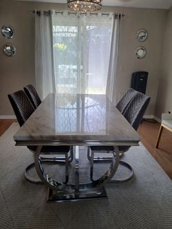 Dining table set with 4 velvet chairs and chrome legs
