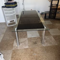 Table And Leather Chairs