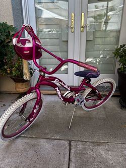 Girls Bicycle And Helmet