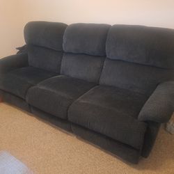 Recling Sofa 96 Inches Long  Navy Blue With Multi Color  Almost New  No Wear  Just Remolding 