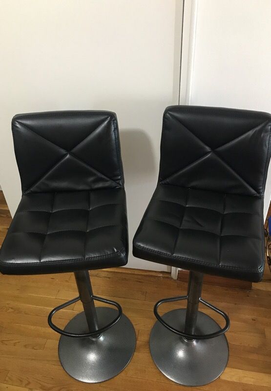 Adjustable height barstools - less than a year old