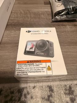 DJI Osmo Hero 4 with tripod