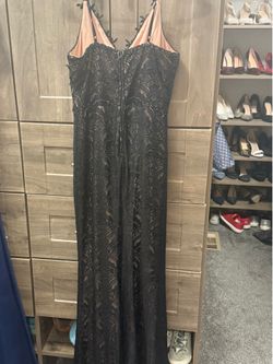 Black lace over tan formal gown