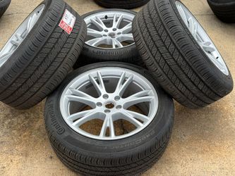 19” OEM TESLA MODEL Y GEMINI WHEELS SILVER WITH CONTINENTAL [hidden information]% TREAD