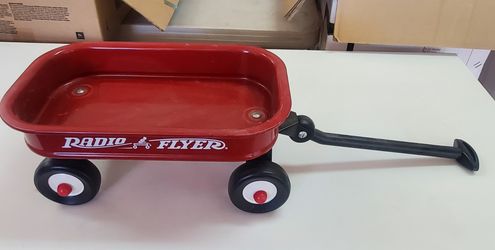 Doll red flyer wagon