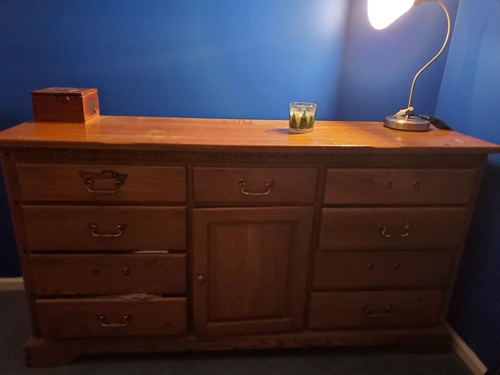 Large 12 drawer completely wooden dresser.