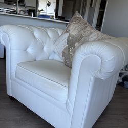 White tufted chair