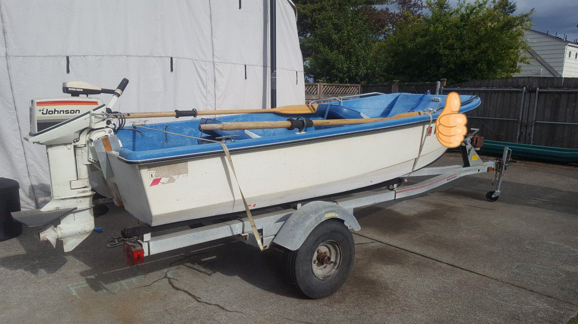 12' Livingston Boat with motor and trailer.