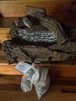 Natural gas logs, lava rock steel wool new never used Natural gas logs, lava rock steel wool new never used