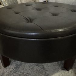 Black round ottoman with storage. 36”X16.5”. Excellent condition!