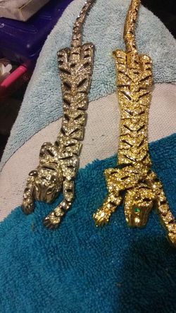 Buying both Antique crystals tiger bracelets with emerald eyes