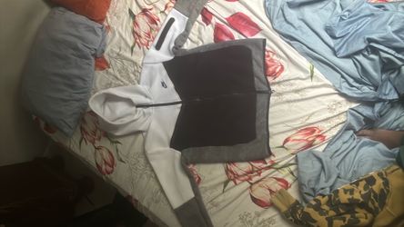 White and grey Nike tech jacket