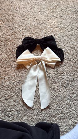 Black and white target bows.