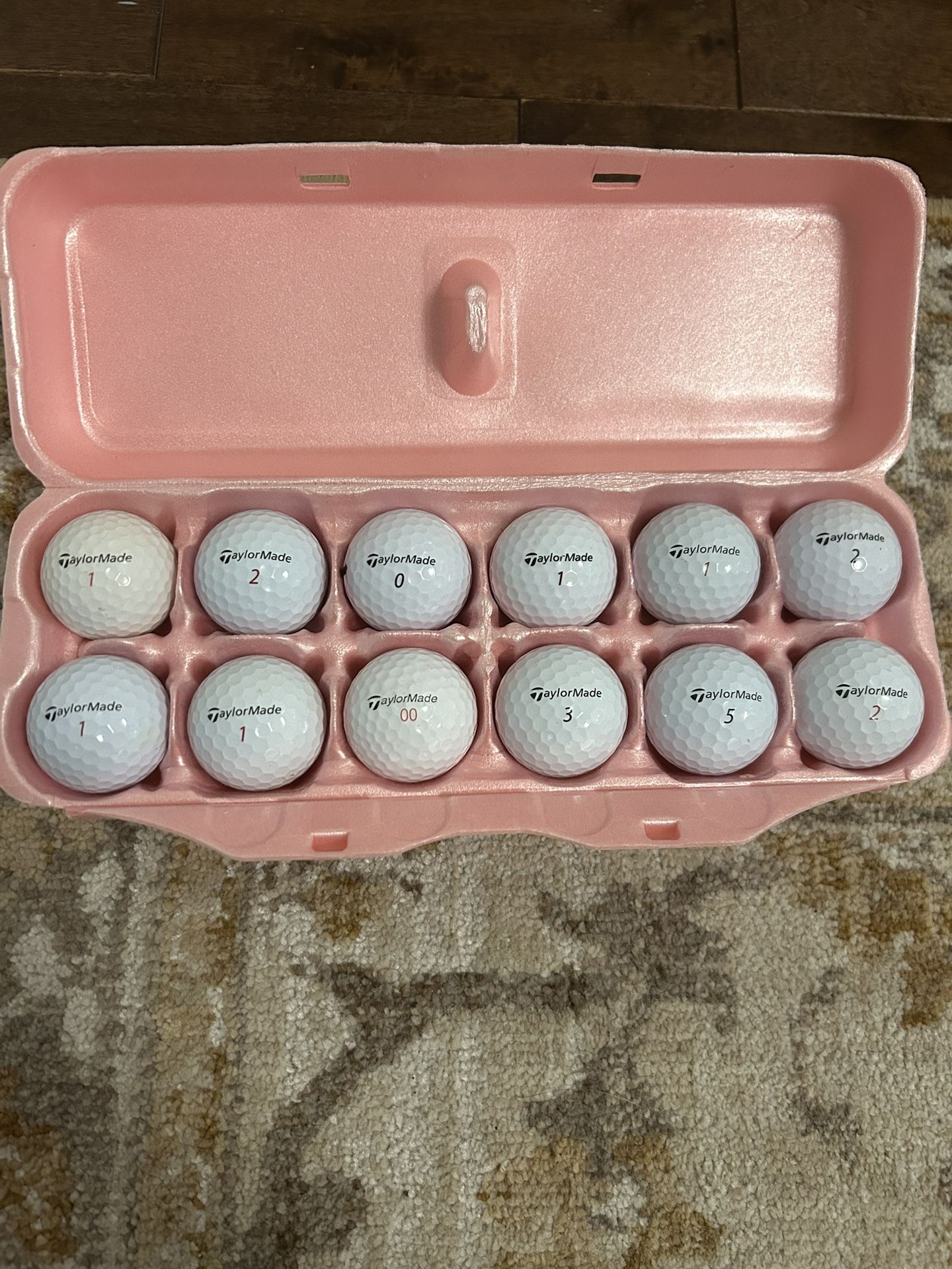 A Dozen TaylorMade Golf Balls