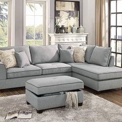 New Reversible Sectional .  Grey Dorris Fabric .  105” X 75”.  Free Delivery !