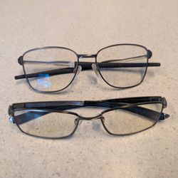 2 Pairs Of Oakley Glasses