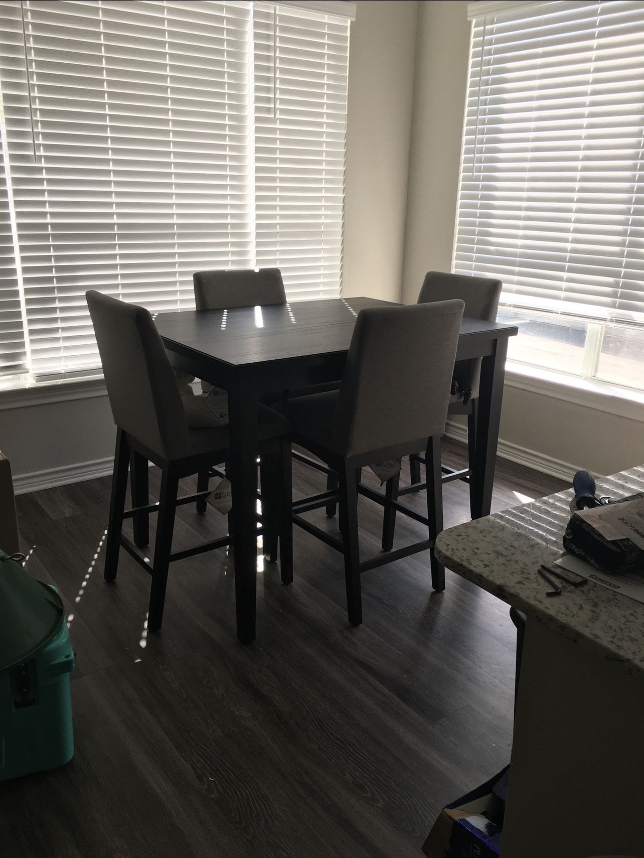 Black Bar-height Table With Grey Chairs